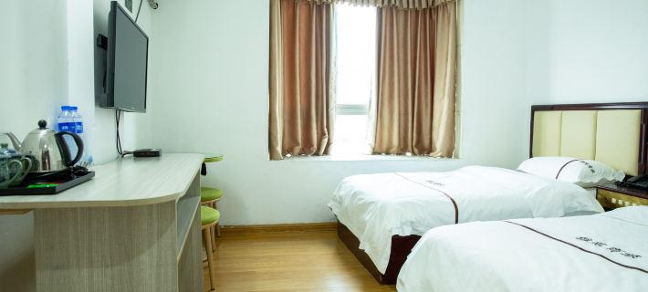 Yayuan Business Hostel Ξενοδοχεία στην πόλη Γιανγκτσούν