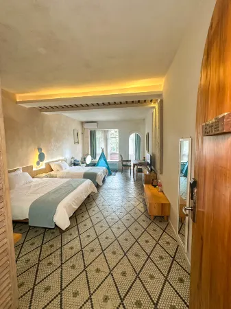 MULI HOUSE Отели рядом с достопримечательностью «Beihaihaijing Square»