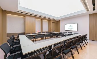 Magnolia Business Hotel ( Dalian Jinzhou Hengda Garden)