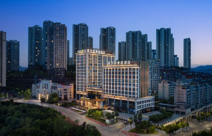 SUITES BY HILTON