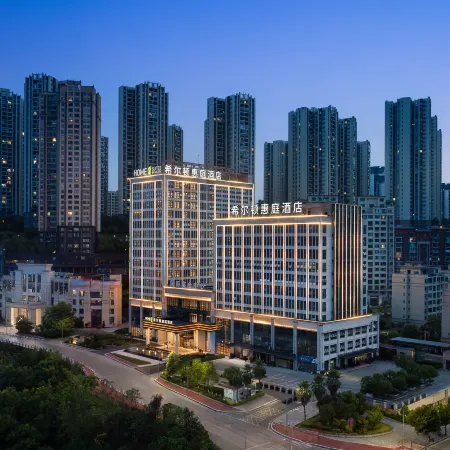 SUITES BY HILTON