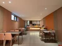 Chonpines Hotel (Daqing West Railway Station Wanda Plaza Branch) - فطور