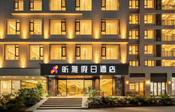 Xishuangbanna Xinya Holiday Hotel (JingHong Gao Zhuang Xi Shuang Jing Xingguang Night Market Branch)
