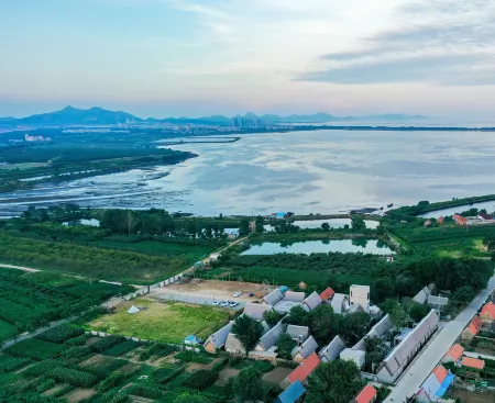 Bufu Seaweed Art Villa Отели рядом с достопримечательностью «Hai Lv Dao»