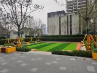 Sumei Movie Hotel (Zhengzhou East Railway Station East Square Huaren New Era Plaza) - Apartments