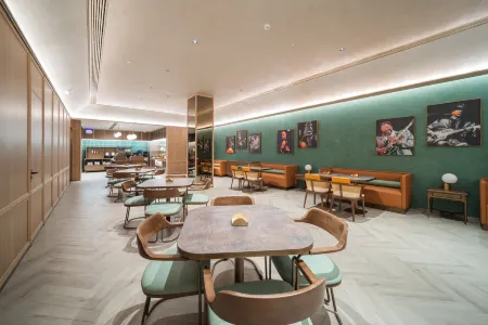 Orange Hotel (Huangshi North Station) Отели в г. Хуанши