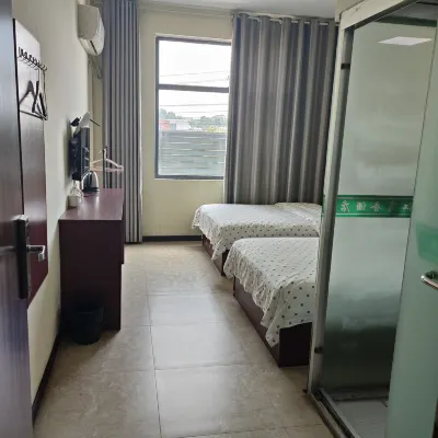 Honghua Tao Town Jiujiang Business Hotel Hotel in zona Yidu Qingjiang Bay Qinglin Leisure Tourism Area
