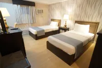 Queen Margarette Hotel Lucena - Main Hôtels à : Lucena