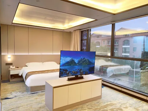 Puding Shiyu Business Hotel (Xingbo International)