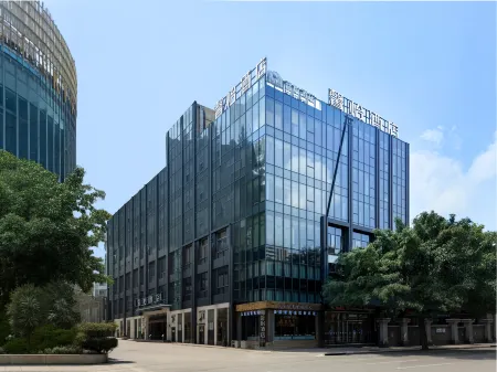 Xinyi Hotel Отели рядом с достопримечательностью «Xingyi Normal University for Nationalities West Campus»