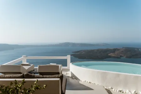 Aqua Luxury Suites Отели в г. Санторини