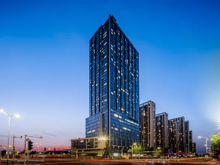 Juzi Time Scenic Hotel (Yantai University Wanxianghui) Отели рядом с достопримечательностью «Wenjing College Yantai University»