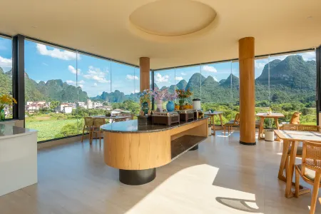 Poetry Meadow Hotel Отели рядом с достопримечательностью «Yulong Bridge»