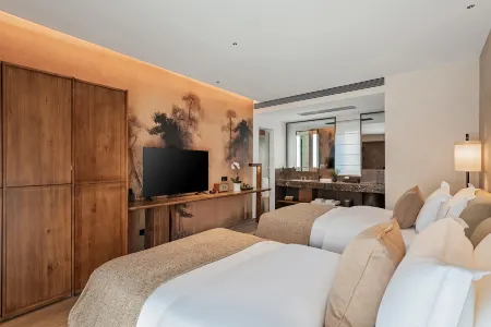 DaLi ShaXi Hotel Nandana Отели в г. Цзянчуань