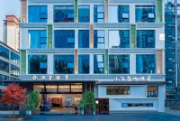 Lansheng Hotel (Xing Yi Jushan Square Mengle City Branch) - bar