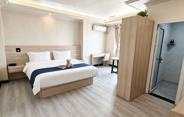 Long An Xin Yi Business Hotel conversion