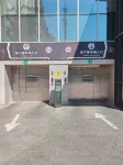 Posher House Urumqi Hotel (Tianshan International Airport · Degang Wanda) - parking