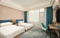 Happy Aile Hotel (Hezhou Lingfeng Square) Hotel dekat Xindu Station (Babu Xindu Finance Office North)