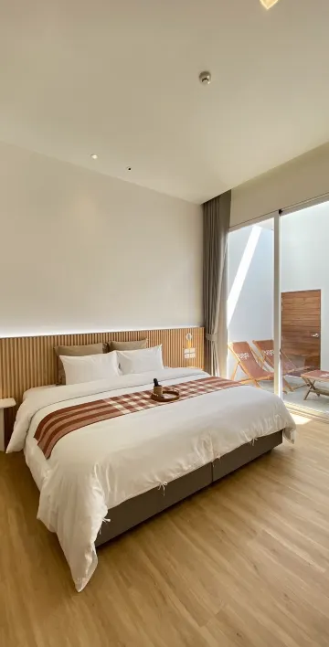 ห้องมาตรฐานเตียงใหญ่ พร้อมอ่างไม้ก๊อก