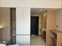 Dongfeng Qiduo Apartment Hotel di Dongfeng