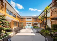 Yuehao. Designer Garden Mei Suk(Lijiang Sifang Street) โรงแรมใกล้เมืองเก่าลี่เจียง