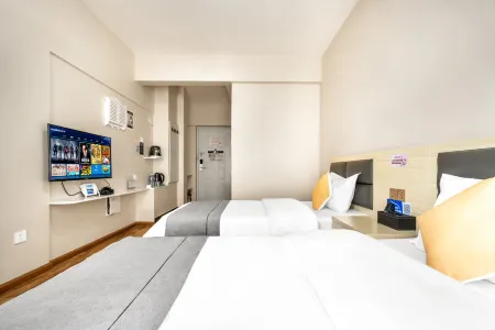 Sherman Hotel Отели рядом с достопримечательностью «Kunming University of Technology Chenggong Campus College of Mechanical and Electrical Engineering»