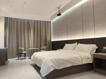 Herui Hotel Отели рядом с достопримечательностью «Shihezi Vocational and Technical College (New Campus)»