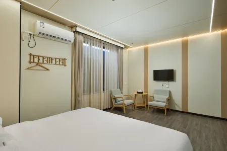 Floral Hotel·Lower Tulou hot spring Hotel Отели рядом с достопримечательностью «Tong'an Library»