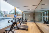 MEHOOD LESTIE Hotel (Dongfang Railway Station Wanda Plaza) - Gym
