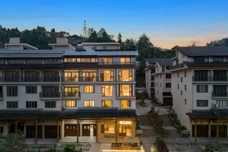 Qixi Guesthouse (Xianju Yong'an River Rafting Branch) Отели рядом с достопримечательностью «Yong'an Park (Chenxi Road)»