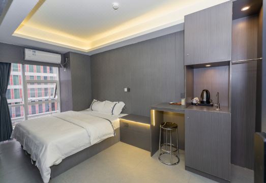 Yiqu Travel Serviced Apartment