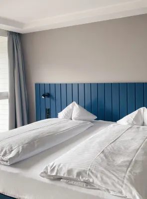 HOP Apartments & Suites Отели в г. 