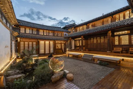 Floral Hotel· Weimo Jingshe Hotel Отели рядом с достопримечательностью «Puji Temple of Lijiang»