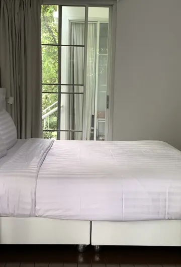 ห้องพักสำหรับสามท่านพร้อมวิวสวน