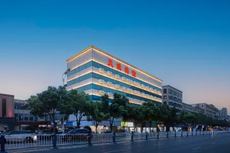 Tiancheng Business Hotel Отели рядом с достопримечательностью «Valley of Flowers Adventure Park»