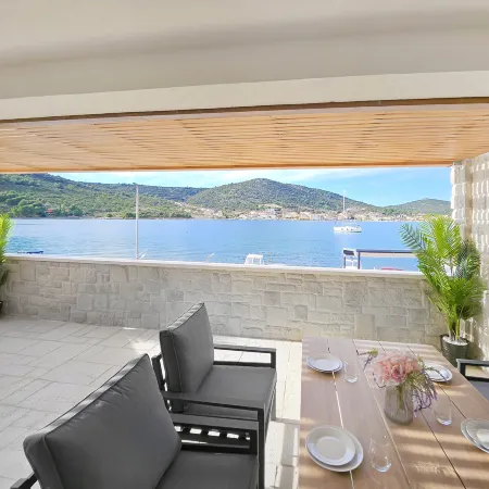 Seafront villa Kupinica with private indoor Pool