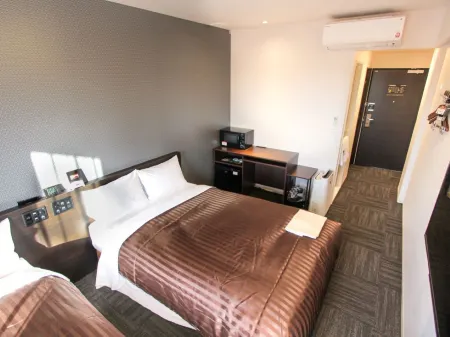 Hotel Livemax Osaka Kadoma Отели в г. Сидзёнавате