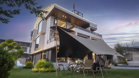 Jiuhua Mountain This Xin'anchu Homestay Отели рядом с достопримечательностью «Jiu Hua Shan Dayuan Buddhist Culture Park»