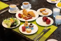 Floral Hotel · Hengdian Qingyan Hotel (Huaxia Cultural Park Store) - sarapan