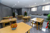 Tumxuk Yixin Business Hotel