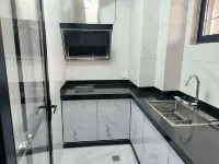 Qidian Apartment - مطابخ