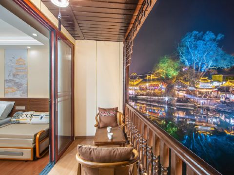 FengHuang Mengqi stilted building river view homestay