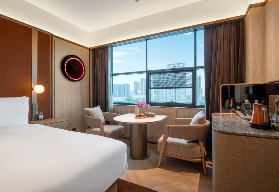 Crystal Orange 호텔 충칭 서역의 모던하고 쾌적해 보이는 객실 내부 사진