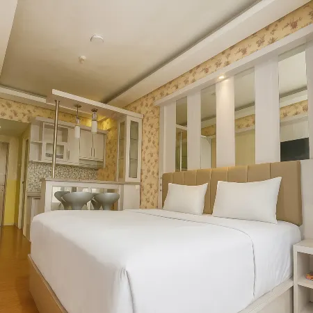Quintessa Room at Candiland Apartement