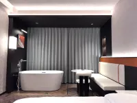 Xinglin Design Hotel (Luliang Jinhui Commercial City)
