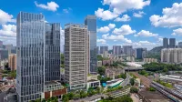 Qiju · Yijing DESIGNER Audio-Visual Residence (Shenzhen Zhongzhoufang Sungang Subway Station) - مطابخ