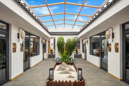 Yiliu Ximei Homestay (Wutai Mountain Scenic Area Branch) Отели рядом с достопримечательностью «Shiziwo Temple»