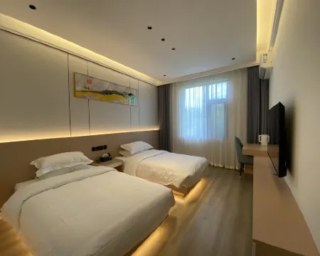 Maitreya Ruixiang Hotel Hoteles en Ciudad de Mile