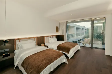 ANQUI Boutique Hotel (San Yang Wetland Branch) Отели рядом с достопримечательностью «Wenzhou University (Chashan South Campus)»