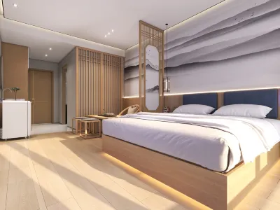 Xinxiang Zimu Hotel (Baolong Plaza) Hotels in East University Town